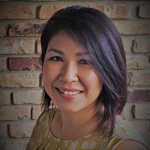 Julie Insyxiengmay Headshot.jpg